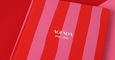 Red and pink striped agenda book for 2026-2027, perfect for planning.