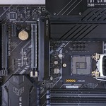 High-performance ASUS TUF Gaming Z590 motherboard with advanced circuitry for gaming and computing.