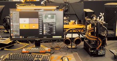 Modern gaming gear setup on display at a tech expo.