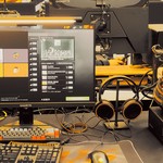 Modern gaming gear setup on display at a tech expo.